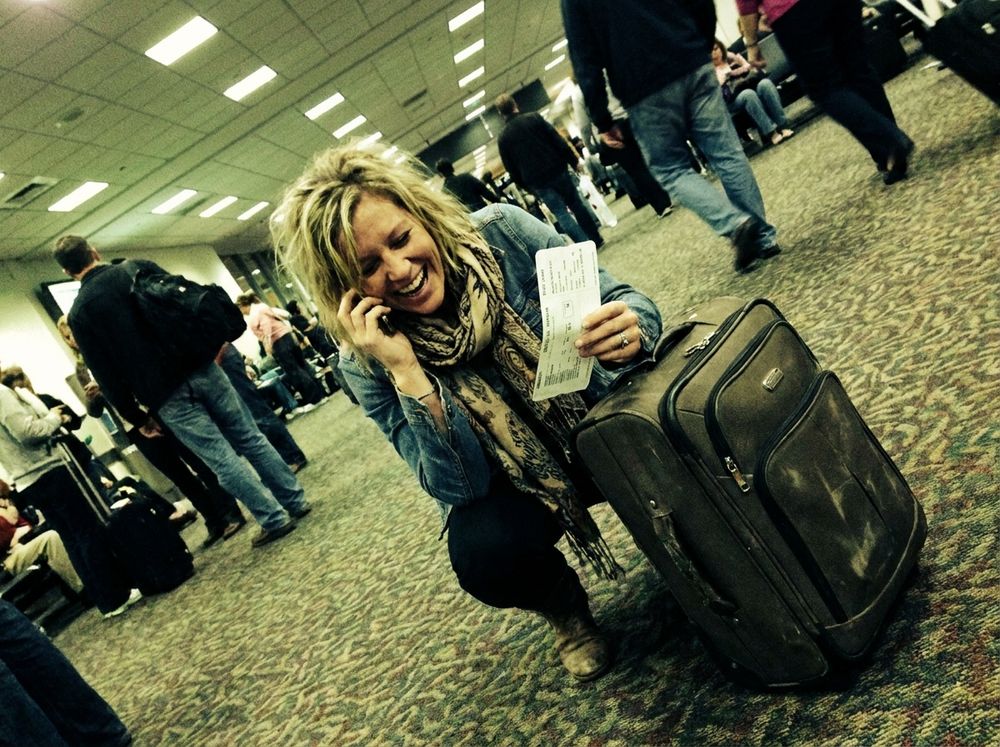 Karen calling her mother from the airport gate